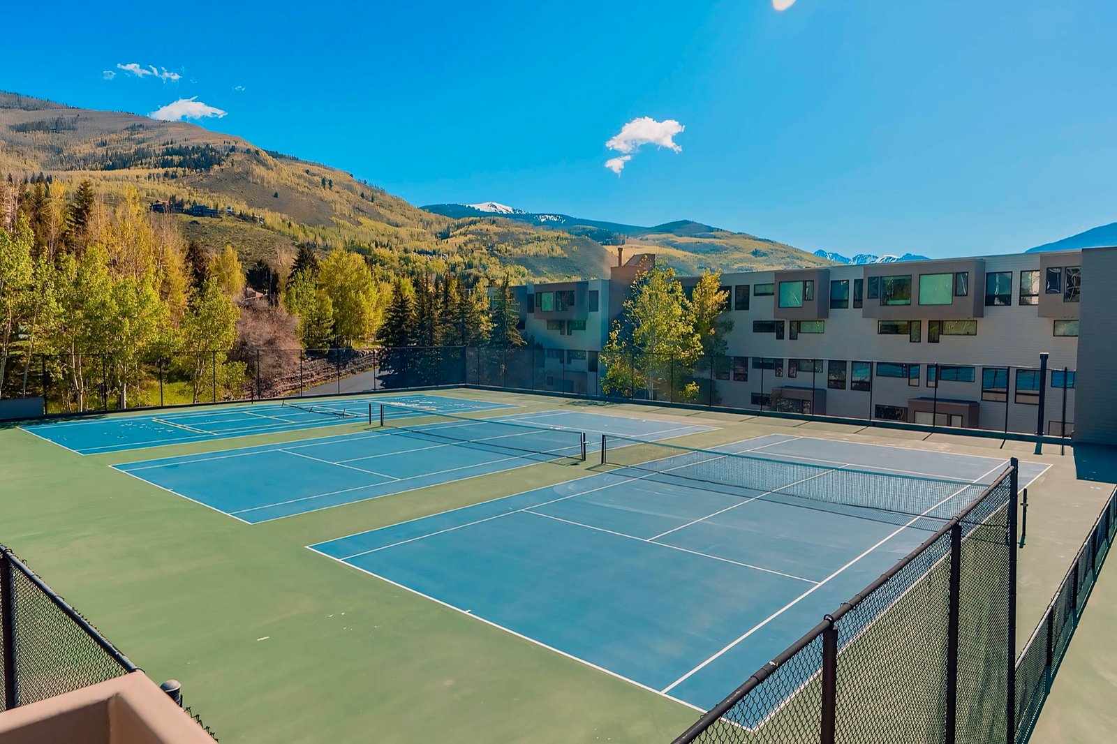 Tennis courts with mountain views